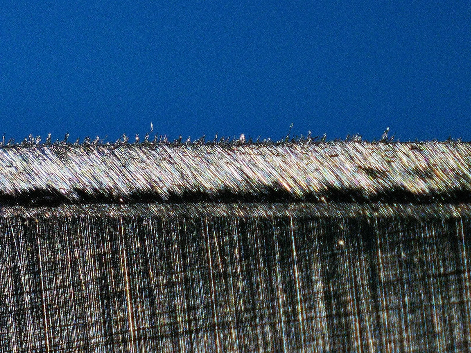 Marker removed by the abrasive, showing that the correct sharpening angle has been selected
